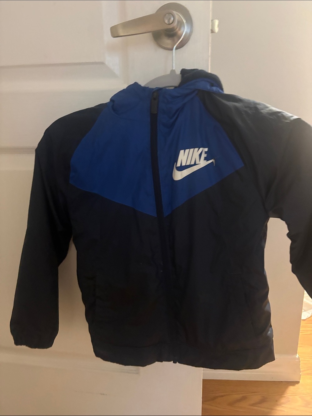 Nike Kids Blue and Black Hooded Rain Jacket with White Logo